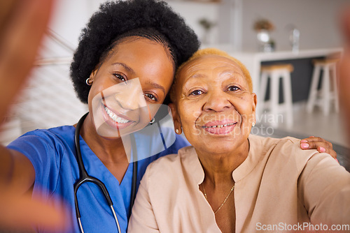 Image of Black people, nurse and hug in elderly care for selfie, love or support and trust together at home. Portrait of happy African medical caregiver with senior female person smile for photo in the house