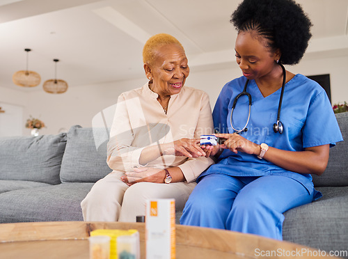 Image of Senior woman, doctor and oximeter test in nursing home, healthcare service and medical support on sofa. Blood oxygen or pulse measure of elderly patient in retirement and african nurse helping
