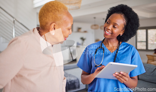 Image of Tablet, senior black woman and nurse in home for healthcare, support and help. Caregiver, technology and happy elderly person in consultation with doctor for wellness, nursing and medical service