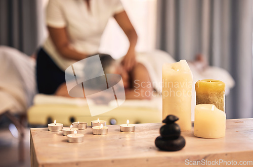 Image of Massage, spa aroma candles and woman at beauty salon for wellness, spiritual service and body healing. Physiotherapy, aromatherapy flame and relax person with zen peace, calm fire or masseuse support