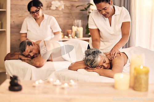 Image of Massage, senior and a couple at the spa to relax on their anniversary together for peace, wellness or bonding. Luxury, beauty or body care with an old woman and man in a salon for physical therapy