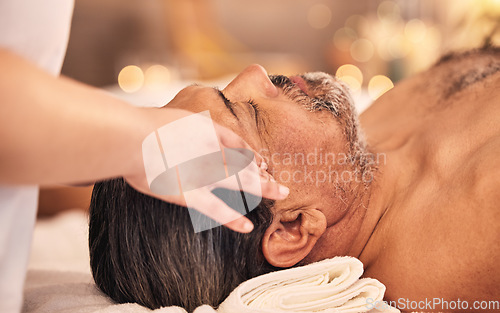 Image of Man, facial and head massage at spa for break, skincare therapy and holistic healing at cosmetics salon. Face, peace or calm mature male client relax for zen wellness, acupressure and scalp treatment