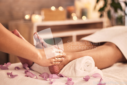 Image of Reflexology, foot and hands massage at spa for acupressure treatment, zen wellness and circulation therapy. Closeup, feet and client at beauty salon for muscle detox, skincare and relax for pedicure