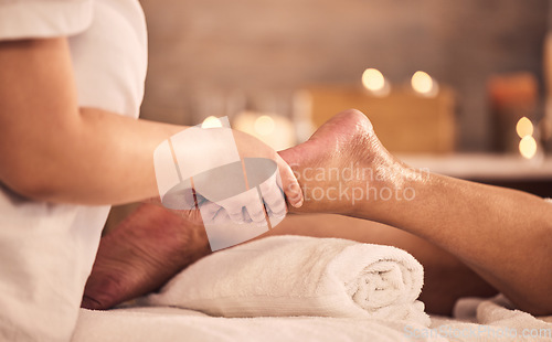 Image of Pedicure, foot and hands of massage therapist at spa for acupressure treatment, wellness and circulation therapy. Closeup of client feet at beauty salon for muscle reflexology, skincare and relax