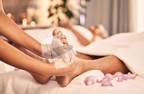 Image of Foot, massage or closeup of spa therapist in acupressure service, luxury wellness and relax for circulation therapy. Feet, client or hands of beautician at salon for pedicure, skincare or reflexology