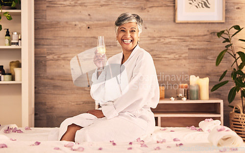 Image of Spa, champagne and happy woman in portrait for facial, massage and holiday celebration or self care. Excited, wine glass and senior person luxury, wellness and relax with hospitality service or hotel