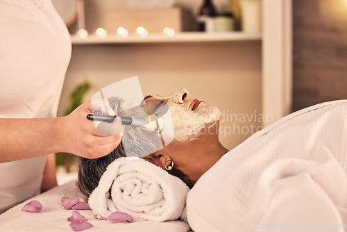 Image of Woman, relax and brush face mask at spa, skincare treatment and zen therapy in beauty salon. Calm mature female person at wellness resort for facial cleaning, hydration cosmetics and dermatology glow