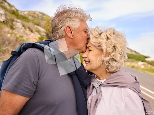 Image of Senior couple, fitness and run with kiss, forehead and nature for love, wellness or outdoor exercise. Elderly man, woman and romantic with bonding, happy training and workout for health in retirement