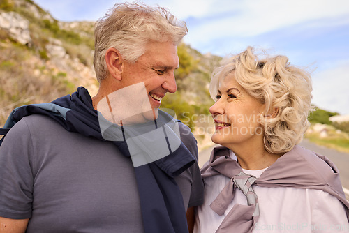 Image of Senior couple, smile and love for fitness, outdoor or nature for motivation, wellness or exercise. Elderly man, woman and romantic eye contact with bonding, training or workout in mountain for health