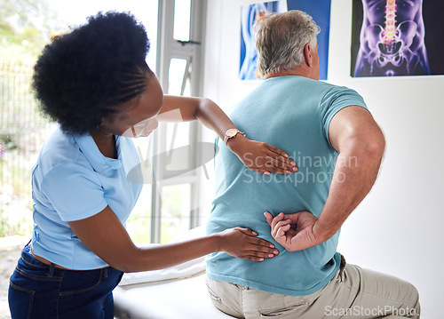 Image of Physiotherapy, chiropractor and senior man with back pain or physiotherapist consulting a patient for muscle injury. Arthritis, physical and medical professional help elderly person with massage