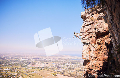 Image of Nature, rock climbing and space with man on mountain for fitness, adventure and challenge. Fearless, workout and hiking with person training on cliff for travel, freedom and exercise mockup