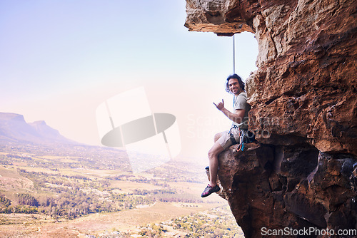 Image of Rock climbing, shaka and portrait with man on mountains for sports, space and adventure. Nature, exercise and travel with person training on cliff for rope, challenge and performance mockup