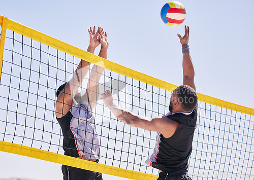 Image of Beach, volleyball and team with competition at ocean and sea with exercise, sport and fitness. Summer, outdoor and training people playing for health, action games and workout with ball in nature