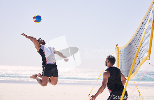 Image of Beach, volleyball serve and team with competition at ocean and sea with exercise, sport and fitness. Summer, outdoor and training people playing for health, action game and workout activity in nature