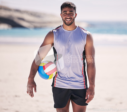 Image of Beach, sports and portrait of man with volleyball for training, exercise and cardio health in nature. Ocean, game and happy face of male player smile at sea for fun, fitness and workout performance