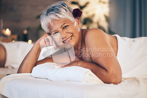 Image of Senior woman, massage and portrait with luxury treatment in retirement with a smile. Female person, beauty salon and spa room together with cosmetics, wellness and happy from peace and hospitality