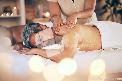 Image of Senior man, sleeping and relax for back massage, spa treatment or body care in physical therapy at resort. Calm elderly male person relaxing or asleep on salon bed for zen, stress relief or getaway