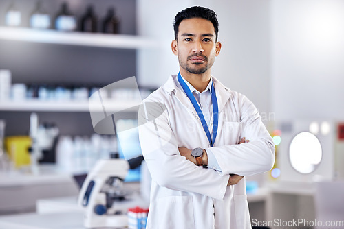 Image of Scientist, man and arms crossed in portrait, science study for medical research in laboratory with confidence. Biotechnology, serious male doctor and scientific experiment, future and investigation