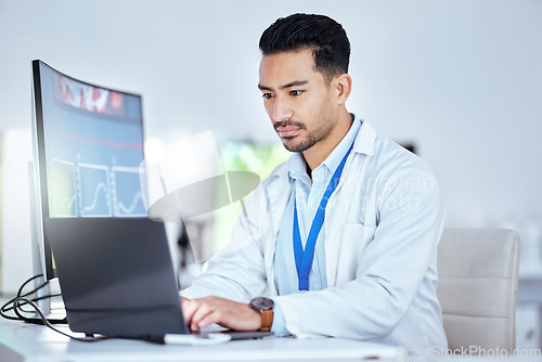 Image of Science, asian man and typing on laptop in laboratory for medical planning, innovation and data analysis. Male researcher, scientist and focus for working on computer report, results or biotechnology