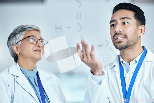 Image of Science, planning and team of researchers with a board working on a medical chemistry equation. Pharmaceutical, teamwork and scientists doing research for a healthcare experiment or project in a lab.