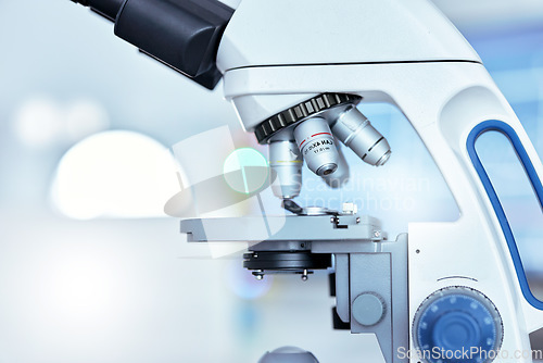 Image of Microscope, science and medical with research, analysis and sample with testing, cure and diagnosis. Lab equipment, tools and studying bacteria with healthcare innovation, lens and virus experiment