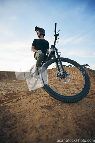 Image of Fitness, extreme sports and man with a mountain bike, training or competition with a challenge. Male person, athlete or cyclist with nature, cycling or exercise with adventure, performance or journey