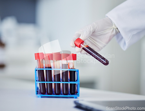 Image of Science, blood and hands with test tube in laboratory for research, medical process and healthcare analysis. Closeup, scientist and bottle with red sample for dna experiment, rna and genetics results