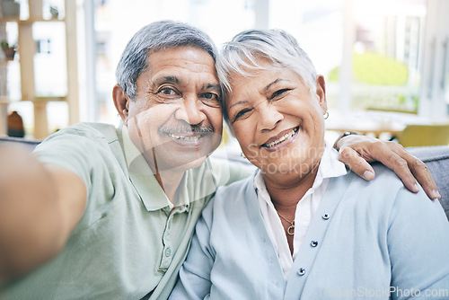 Image of Selfie, home and senior couple with love, hug and retirement with marriage, bonding and quality time. Portrait, happy old man and elderly woman embrace, social media and profile picture with romance