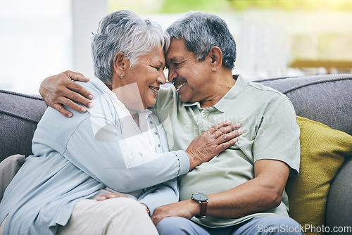 Image of Couch, love and senior couple faces together on a sofa bonding as care, playing and relax to enjoy retirement in a home. Happy, solidarity and elderly people, man and woman with trust in marriage