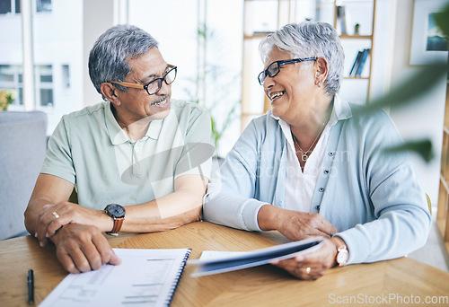 Image of Old couple, smile and financial planning with documents in home for pension, savings or tax. Elderly, man and happy woman with budget, investment and mortgage paperwork for insurance in retirement.