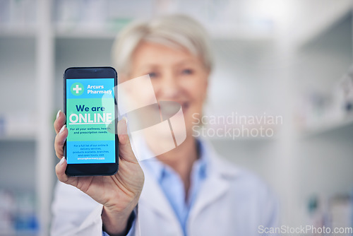 Image of Woman, pharmacist and phone screen for advertising, online marketing or branding at pharmacy. Hands of female person, medical or healthcare professional show mobile smartphone app for advertisement