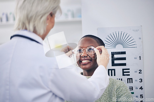 Image of Eye exam, glasses and vision, doctor and patient with women in optometry clinic, health insurance and help. Prescription lens, frame and eyesight, healthcare for eyes and ophthalmology with eyecare