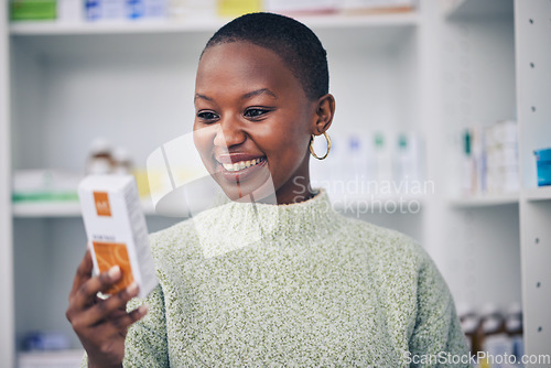 Image of Happy black woman, customer and box of medicine for medical medication at the pharmacy. African female person or patient shopping pharmaceutical product or drugs for healthcare cure at clinic store