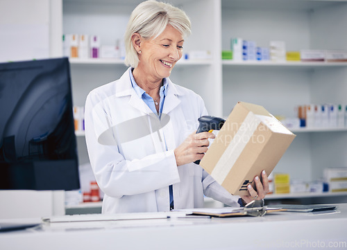 Image of Senior pharmacist, woman and scanning package, cashier with medicine and pharmacy, digital and stock barcode. Pharmaceutical, box of drugs and female person with health, service and retail commerce