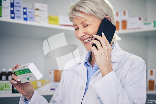 Image of Happy woman, pharmacist and phone call with medication for telehealth, communication or advice at pharmacy. Female person, medical or healthcare expert talking on smartphone for online consultation