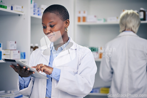 Image of Black woman, tablet and pharmacist with checklist for stock of medicine, information and advice on drugs. Digital list, pharmacy and medical professional with online inventory for telehealth at shelf