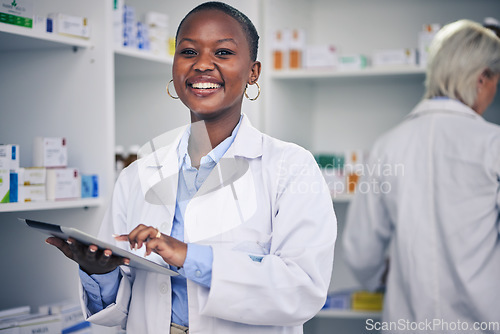 Image of Portrait of pharmacist, black woman with tablet and checklist for stock medicine, information and advice. Digital list, pharmacy and medical professional with smile, online inventory and telehealth.