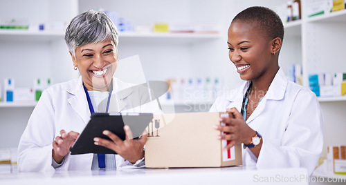 Image of Happy woman, pharmacist and team with tablet and box in logistics for inventory inspection or stock at pharmacy. Women smile with technology, medical or healthcare supplies and pharmaceuticals