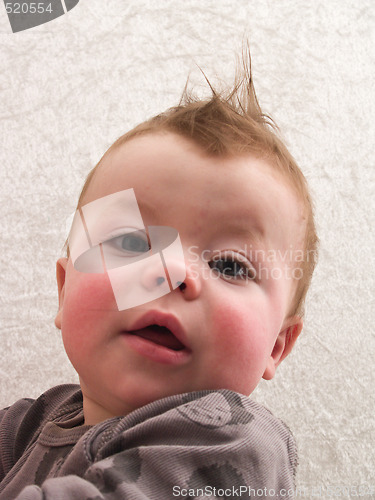 Image of Portrait of surprised baby boy