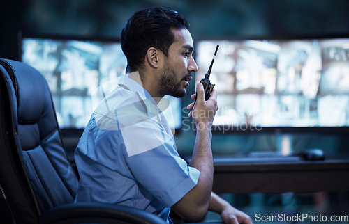 Image of Security guard in control room, man with radio and screen to check cctv in virtual office for alarm. Safety, surveillance and agent, video to monitor crime and privacy for communication in protection