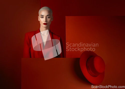 Image of Fashion, portrait and a bald woman on a red background for cosmetics, sexy or vintage aesthetic. Serious, luxury and a young model or girl branding or advertising makeup isolated on a studio backdrop