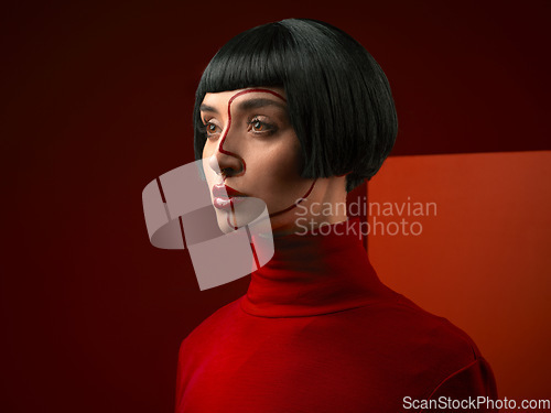 Image of Woman, fashion and face art and makeup with red aesthetic, beauty and vintage on studio background. Retro style, female model has serious expression and cosmetics, attractive and bold with creativity