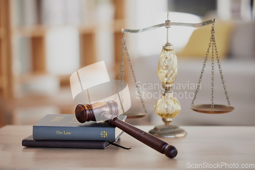 Image of Background, gavel and law books with scales on table of judge, attorney and court trial. Closeup of legal hammer, notebook or desk of lawyer in constitution, equality and human rights of fair justice