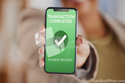 Image of Hands, person and phone screen with transaction completed for ecommerce, finance or digital money. Closeup, smartphone and payment received on mobile, online shopping app or fintech financial service