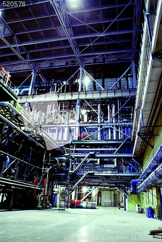 Image of Equipment, cables and piping as found inside of a modern industr