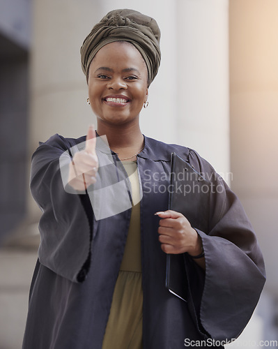 Image of Woman, lawyer and portrait with thumbs up at the court for justice, success and confidence of leader or judge on law case. Happy, agreement and working in legal advice, building or courthouse