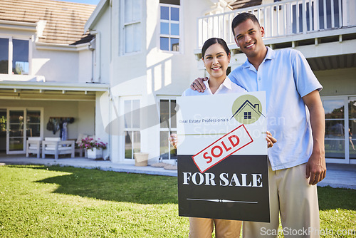 Image of New house, sold sign or happy couple portrait with dream home choice, real estate and property purchase, sale or opportunity. Mortgage, homeowner smile or outdoor people with relocation success board