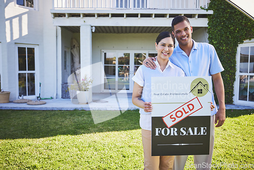 Image of New home, sold sign and happy couple portrait for house, real estate and property purchase, sale or investment. Mortgage, people hug and outdoor woman, man or homeowner embrace for relocation