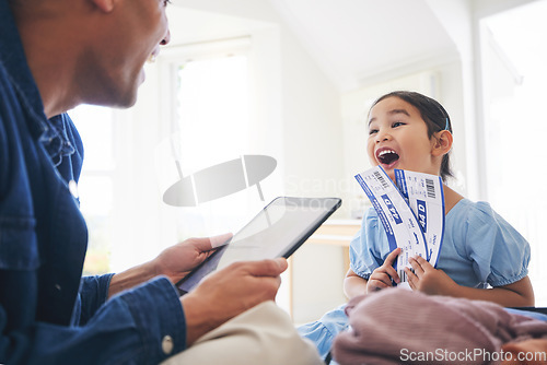 Image of Happy little girl, father and tablet with tickets for travel, vacation or holiday getaway together at home. Dad and excited daughter, child or kid and boarding pass for weekend journey or flight trip