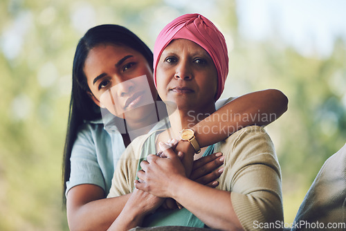 Image of Portrait of mother with cancer, adult daughter in garden and support, love and care in family relationship. Kindness, woman with mom in chemotherapy rehab and hug for courage, hope and healthcare.